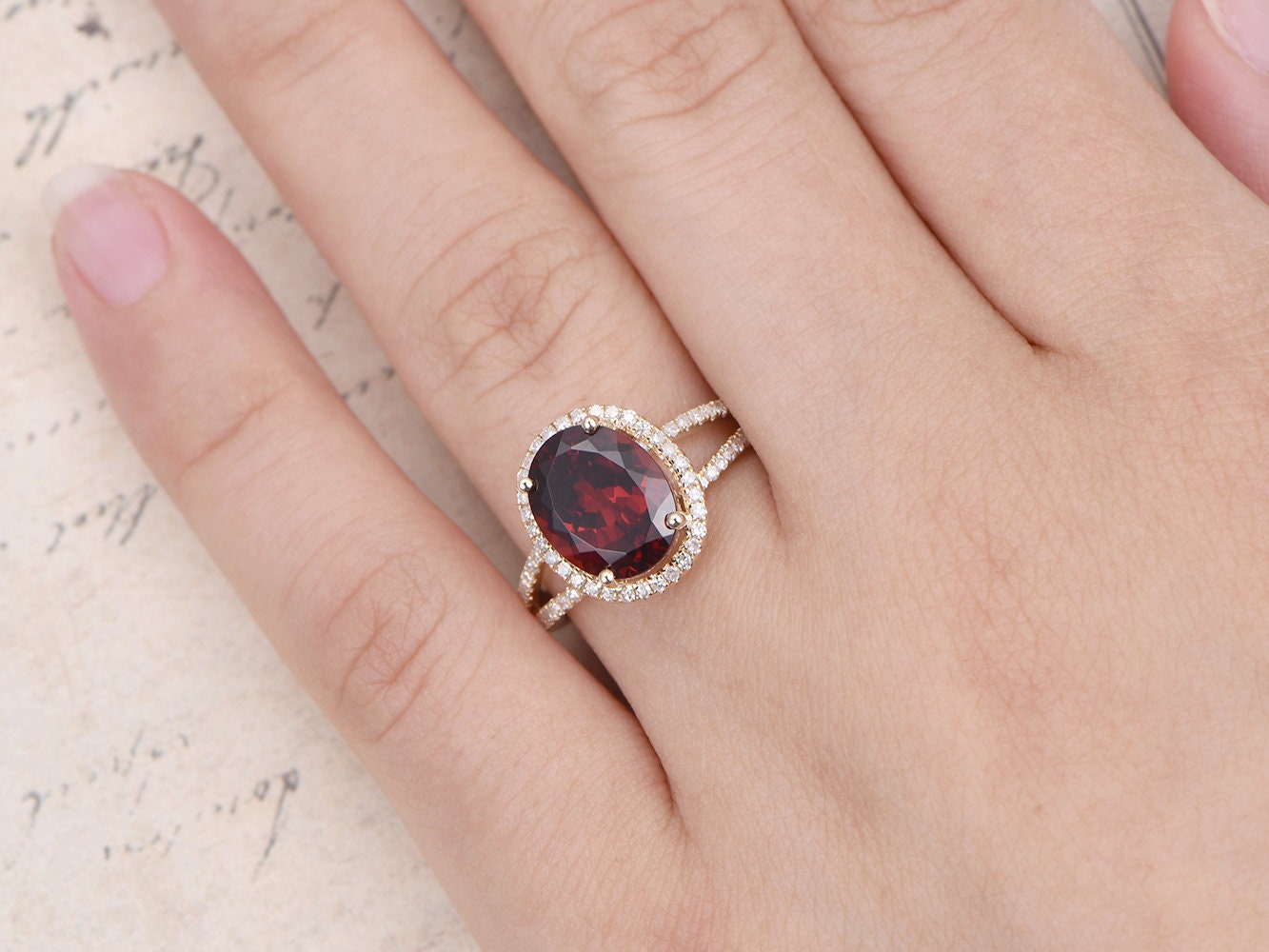 8x10mm-oval-cut-garnet-engagement-ring-split-band-14k-rose-gold-diamond-halo-half-eternity