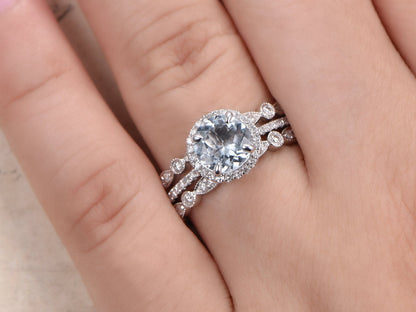 Ensemble de bague de fiançailles en aigue-marine, alliance en or blanc 14 carats avec diamants et halo, bague solitaire en aigue-marine 7 mm, ensemble de bagues de mariée décoratives (3 pièces).