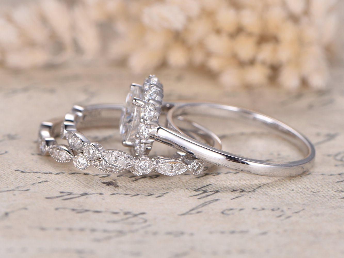 7mm-round-cut-moissanite-engagement-ring-set-3pcs-14k-white-gold-floral-halo-two-art-deco-band