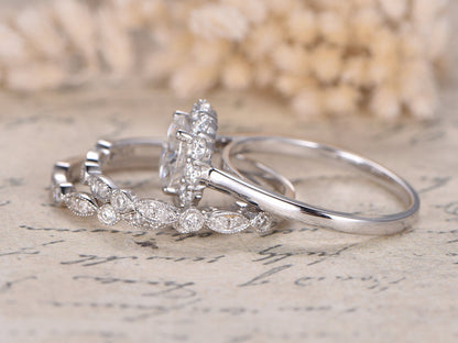 7mm-round-cut-moissanite-engagement-ring-set-3pcs-14k-white-gold-floral-halo-two-art-deco-band