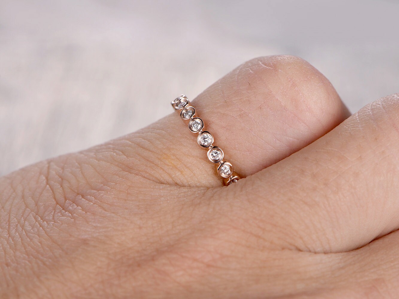 full-eternity-moissanite-wedding-band-solid-14k-rose-gold-bezel-setting