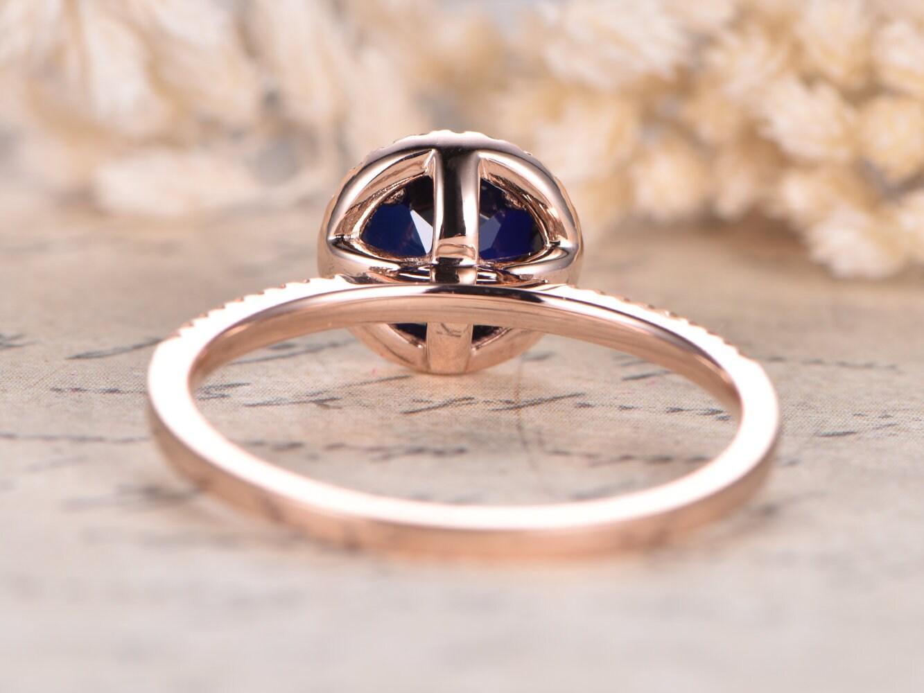 7mm-round-cut-sapphire-engagement-ring-14k-rose-gold-diamond-halo-design