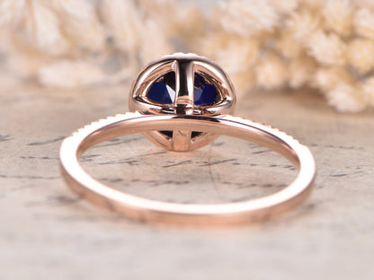 7mm-round-cut-sapphire-engagement-ring-14k-rose-gold-diamond-halo-design