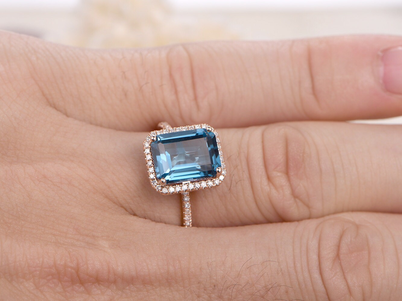 8x10mm-emerald-cut-london-blue-topaz-engagement-ring-14k-rose-gold-diamond-halo