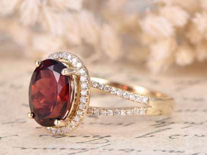 8x10mm-oval-cut-garnet-engagement-ring-split-band-14k-rose-gold-diamond-halo-half-eternity