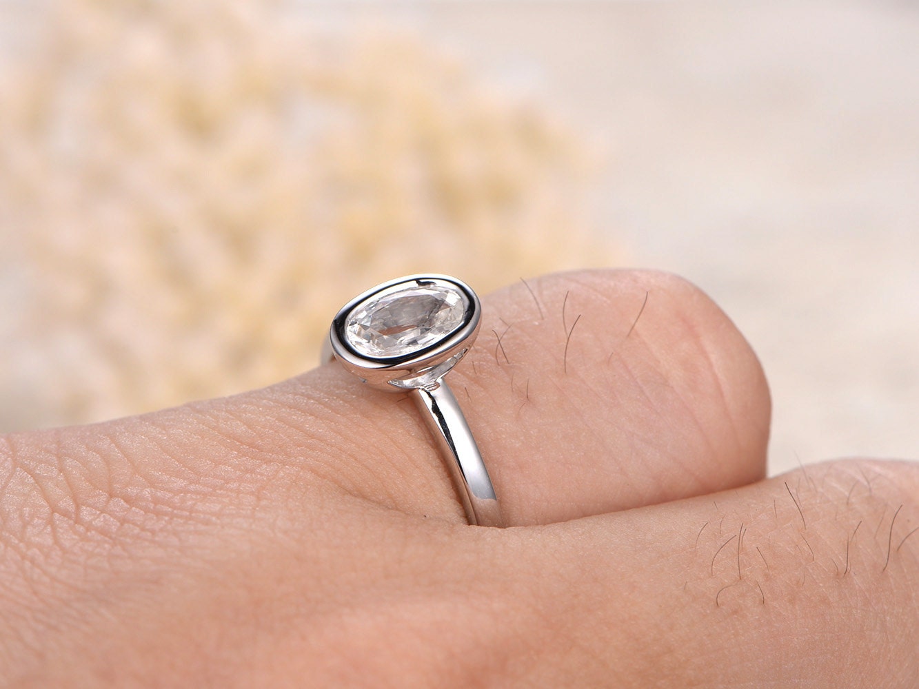 5x7mm-oval-cut-white-sapphire-engagement-ring-14k-white-gold-bezel-set-plain-band