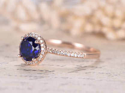 7mm-round-cut-sapphire-engagement-ring-14k-rose-gold-diamond-halo-design