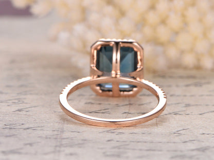 8x10mm-emerald-cut-london-blue-topaz-engagement-ring-14k-rose-gold-diamond-halo