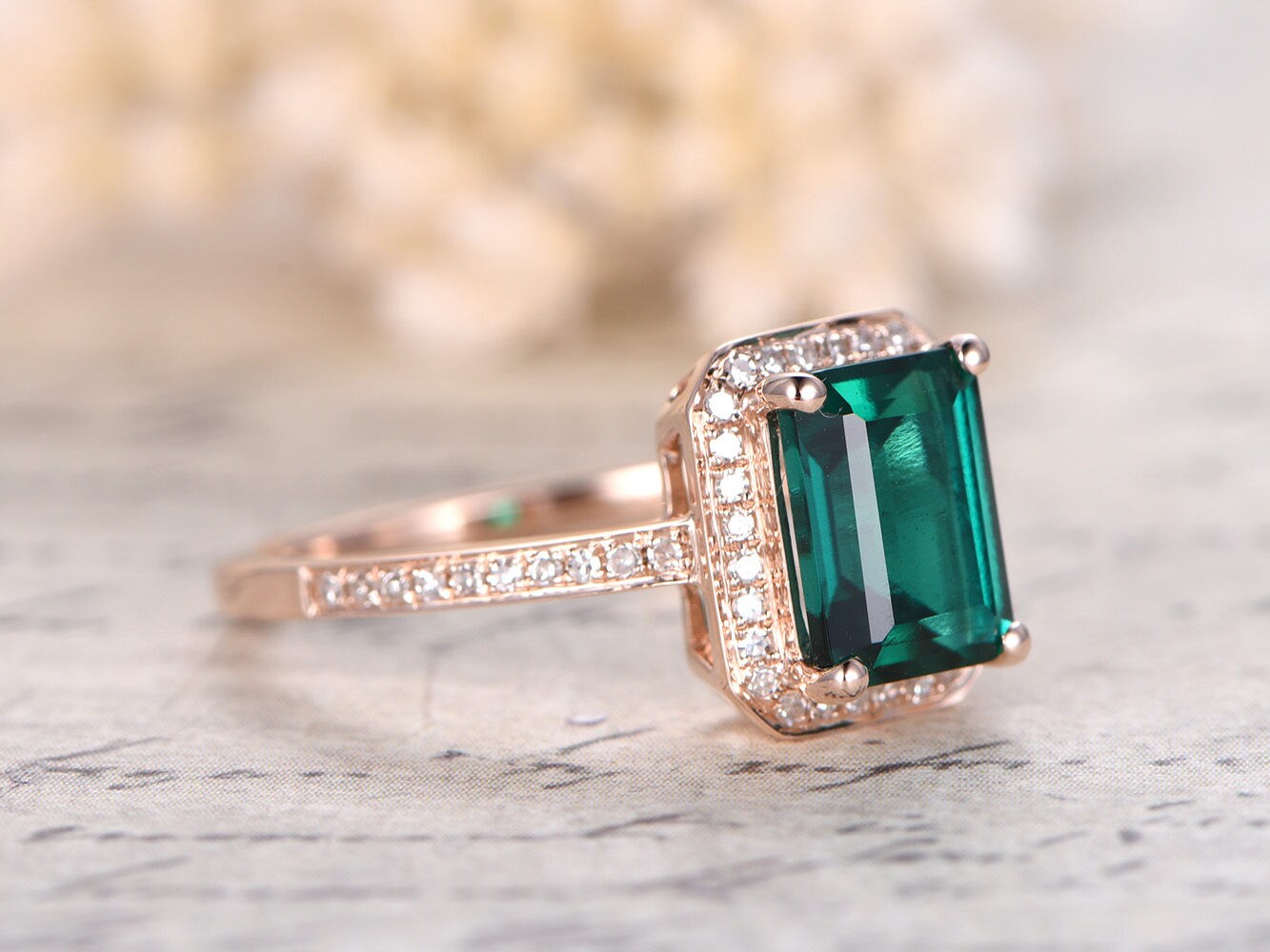 6x8mm-emerald-cut-emerald-engagement-ring-14k-rose-gold-may-birthstone-diamond-halo-half-eternity-band