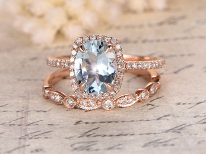 Ensemble parfait ! Bague en or rose 14 carats avec aigue-marine ovale 7x9 mm. Ensemble bague de fiançailles, bague de promesse et bague d'anniversaire.