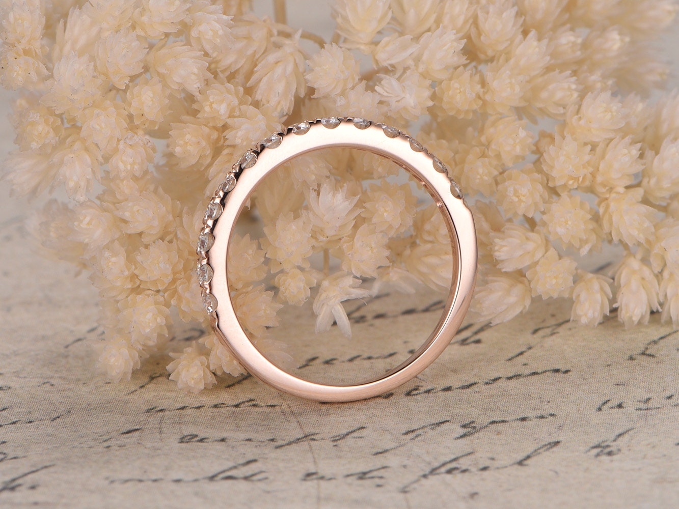 2mm-round-moissanite-14k-rose-gold-wedding-band-half-eternity-ring-pave-setting
