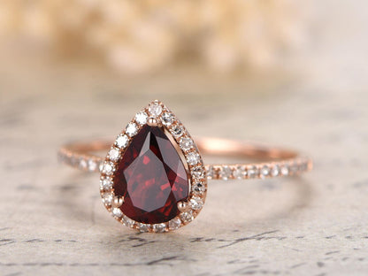 5x7mm-pear-cut-red-garnet-engagement-ring-14k-rose-gold-diamond-halo-half-eternity