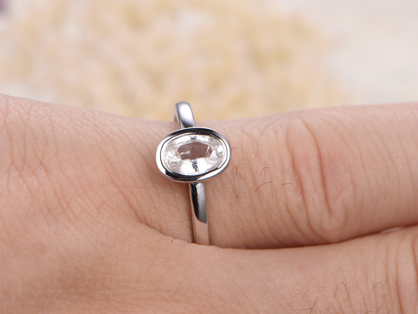 5x7mm-oval-cut-white-sapphire-engagement-ring-14k-white-gold-bezel-set-plain-band