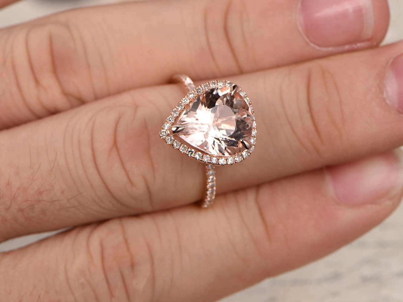 10x12mm-pear-cut-morganite-engagement-ring-14k-rose-gold-pave-diamond-band-halo-design