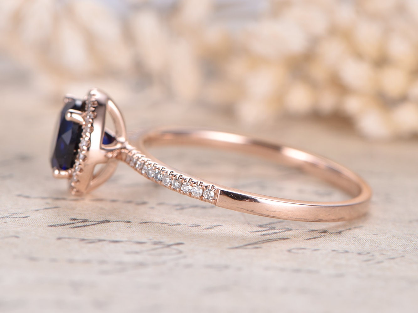 7mm-round-cut-sapphire-engagement-ring-14k-rose-gold-diamond-halo-design