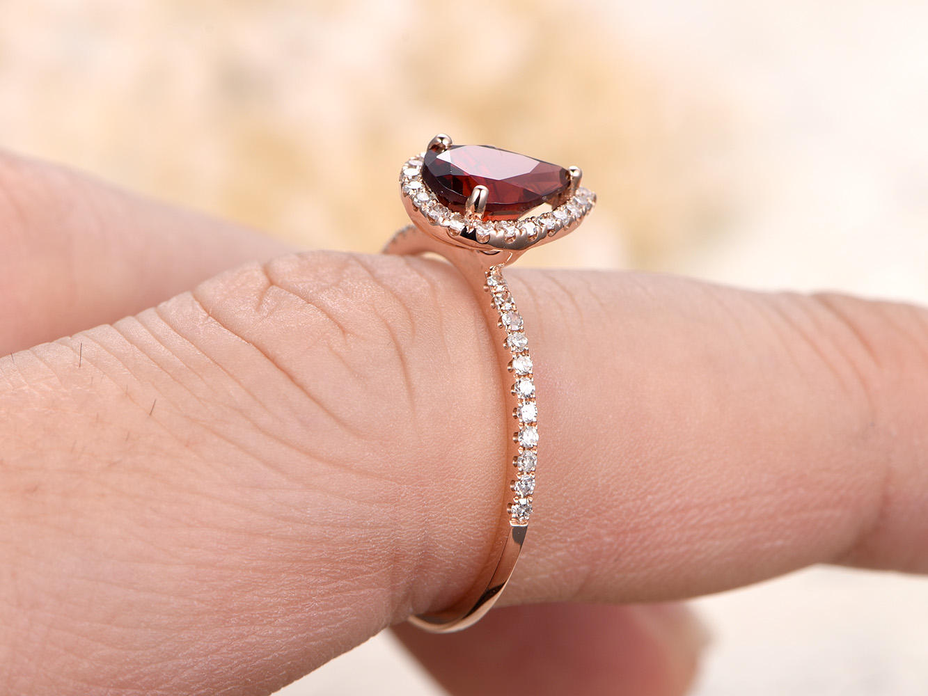 5x7mm-pear-cut-red-garnet-engagement-ring-14k-rose-gold-diamond-halo-half-eternity