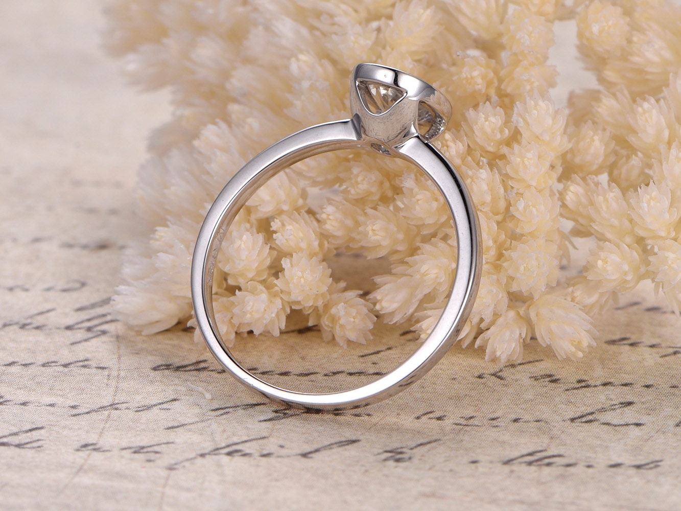 5x7mm-oval-cut-white-sapphire-engagement-ring-14k-white-gold-bezel-set-plain-band