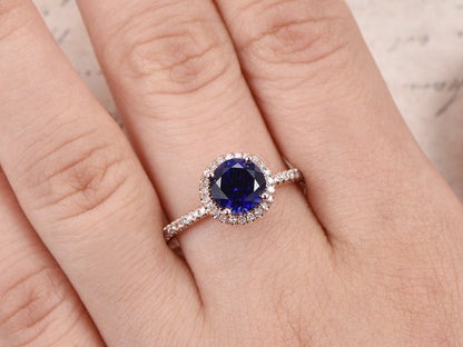 7mm-round-cut-sapphire-engagement-ring-14k-rose-gold-diamond-halo-design