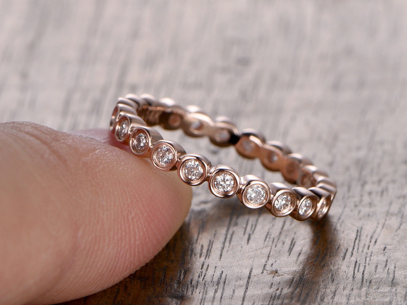 full-eternity-moissanite-wedding-band-solid-14k-rose-gold-bezel-setting