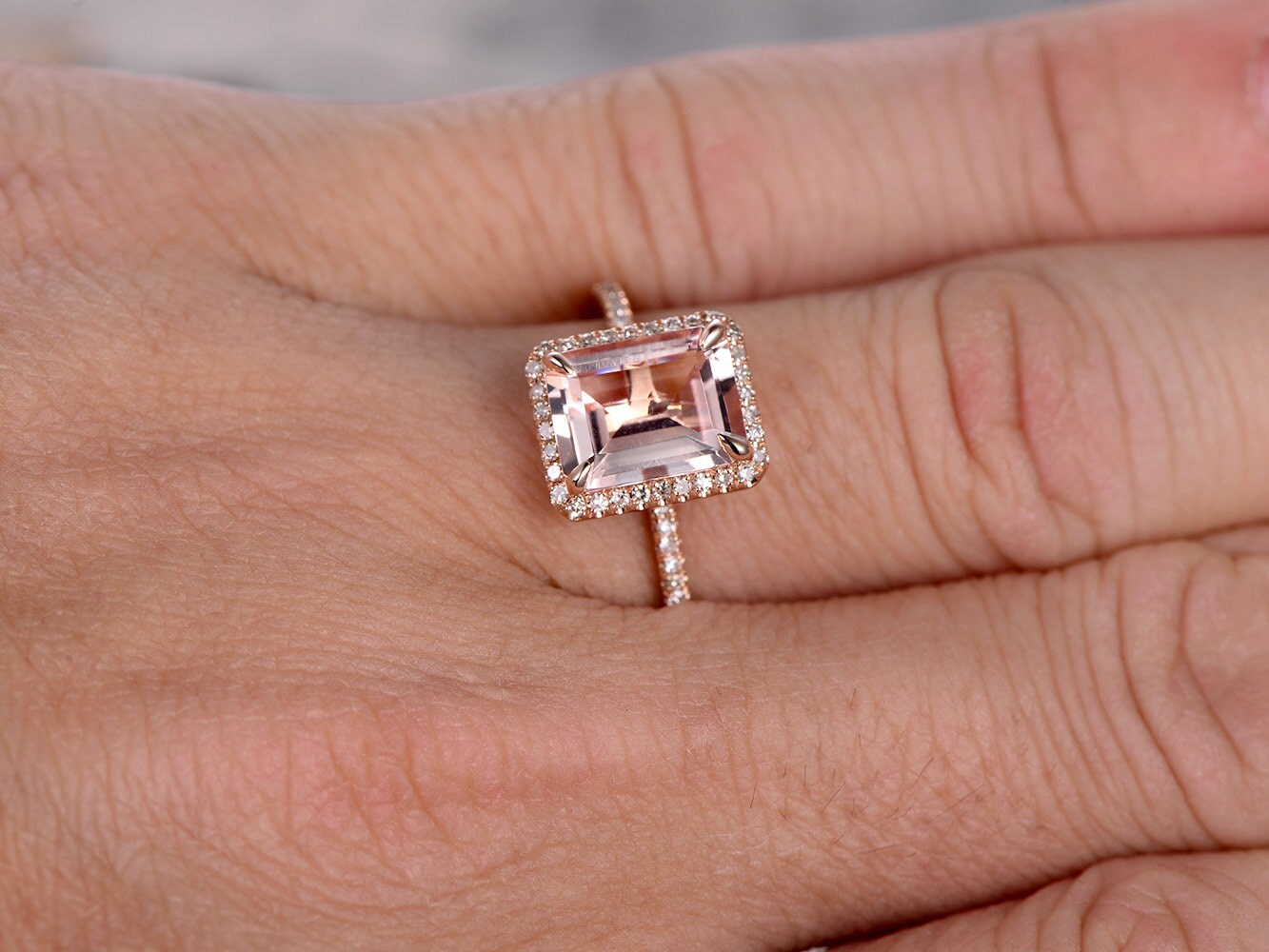 7x9mm-emerald-cut-morganite-engagement-ring-14k-rose-gold-diamond-halo-design