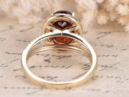 8x10mm-oval-cut-garnet-engagement-ring-split-band-14k-rose-gold-diamond-halo-half-eternity
