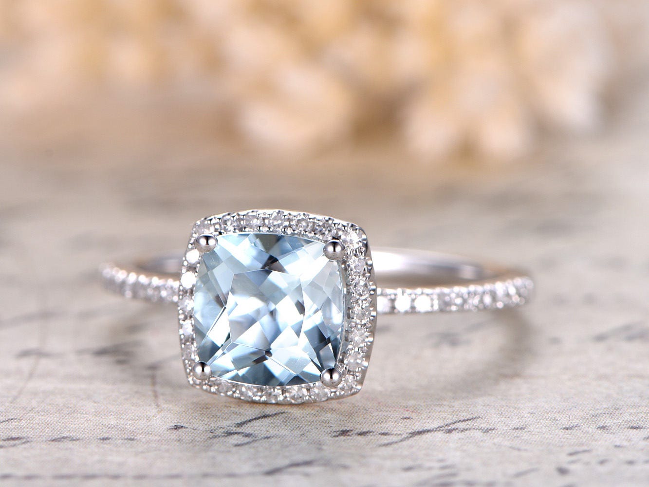 7mm-cushion-cut-aquamarine-engagement-ring-14k-white-gold-half-eternity-diamond-halo-design