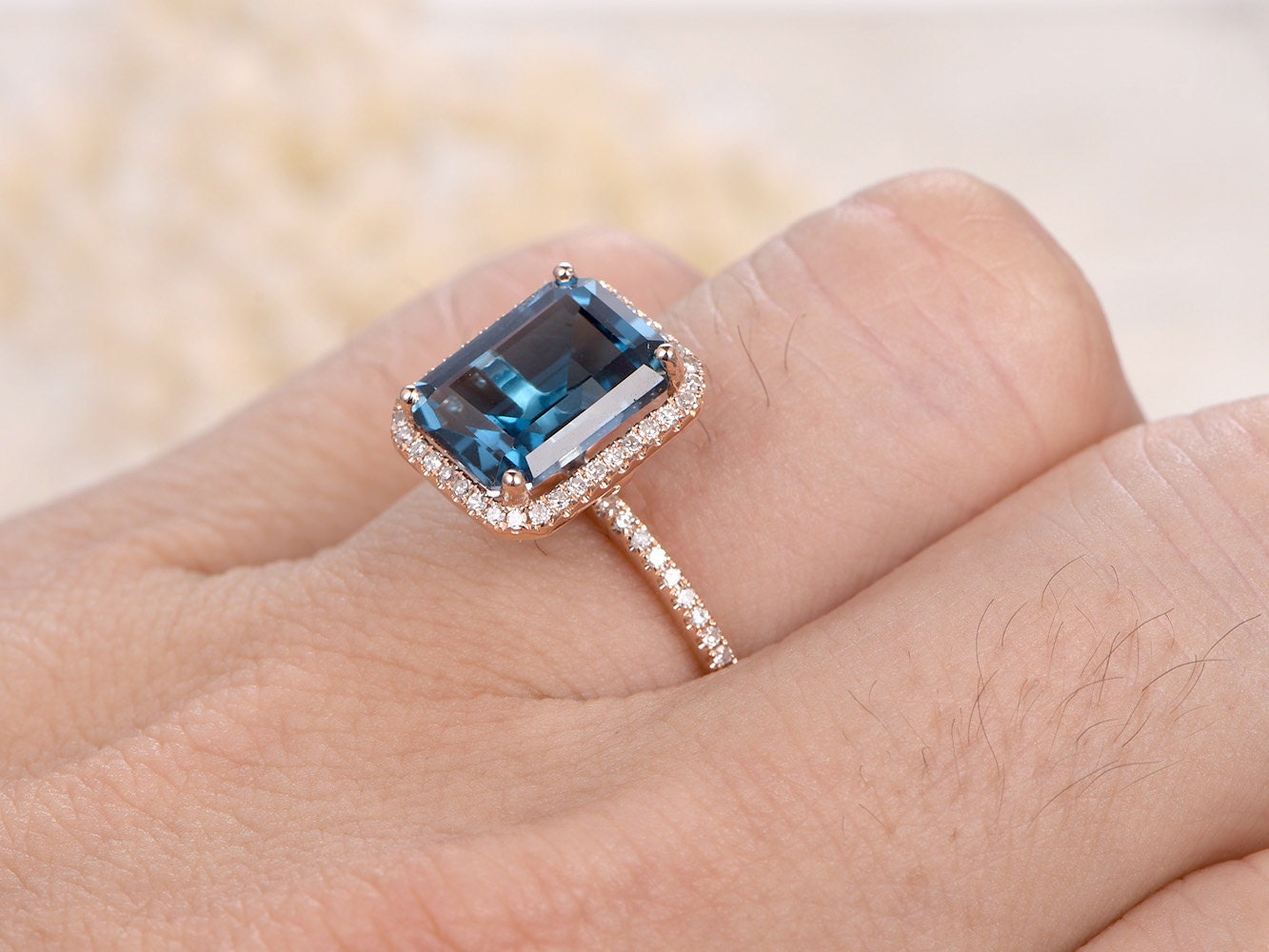8x10mm-emerald-cut-london-blue-topaz-engagement-ring-14k-rose-gold-diamond-halo