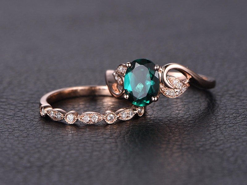 6x8mm-oval-cut-emerald-engagement-ring-set-2pcs-milgrain-14k-rose-gold-diamond-floral-design-art-deco-matching-band