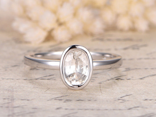 5x7mm-oval-cut-white-sapphire-engagement-ring-14k-white-gold-bezel-set-plain-band
