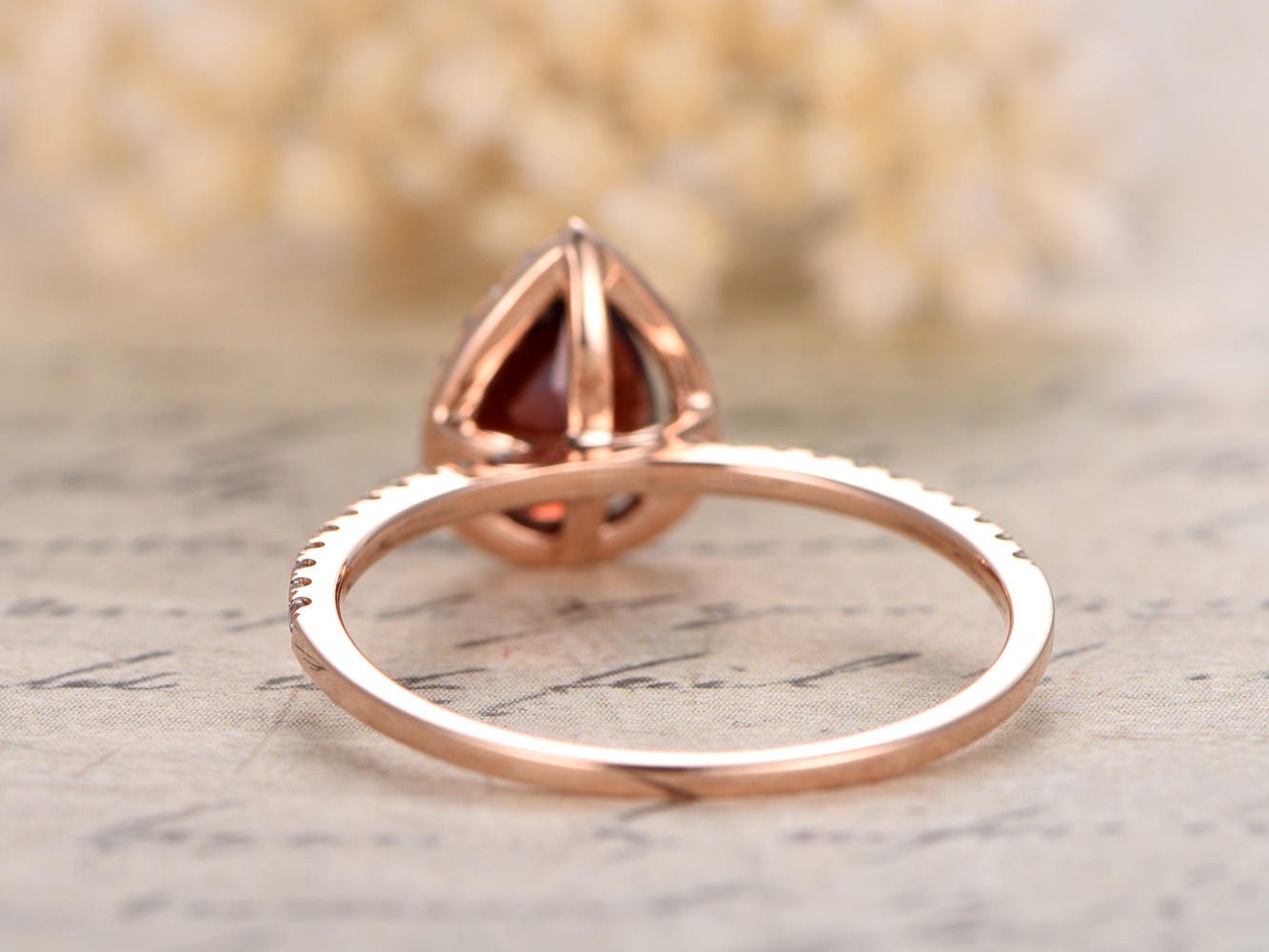 5x7mm-pear-cut-red-garnet-engagement-ring-14k-rose-gold-diamond-halo-half-eternity