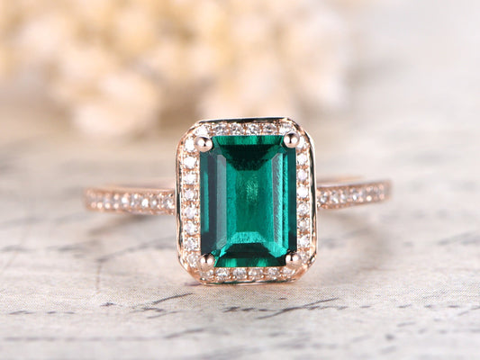 6x8mm-emerald-cut-emerald-engagement-ring-14k-rose-gold-may-birthstone-diamond-halo-half-eternity-band