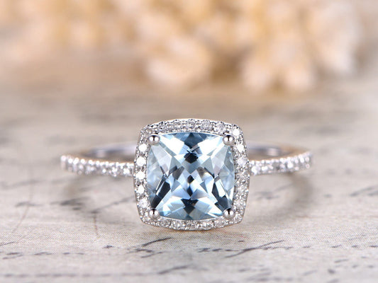 7mm-cushion-cut-aquamarine-engagement-ring-14k-white-gold-half-eternity-diamond-halo-design