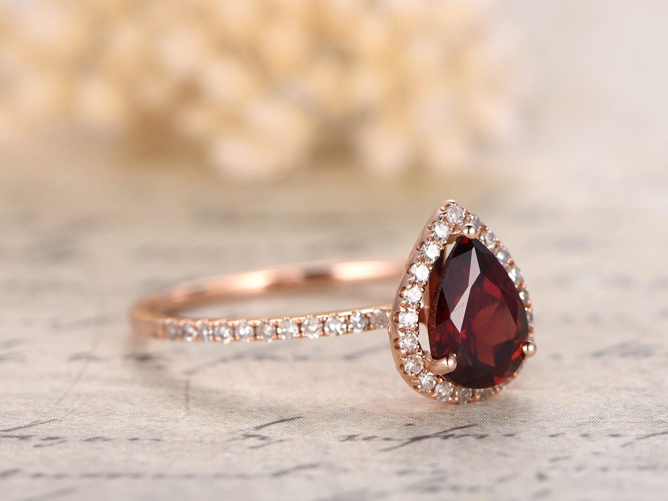 5x7mm-pear-cut-red-garnet-engagement-ring-14k-rose-gold-diamond-halo-half-eternity