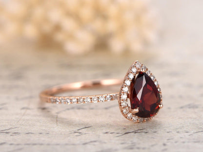 5x7mm-pear-cut-red-garnet-engagement-ring-14k-rose-gold-diamond-halo-half-eternity