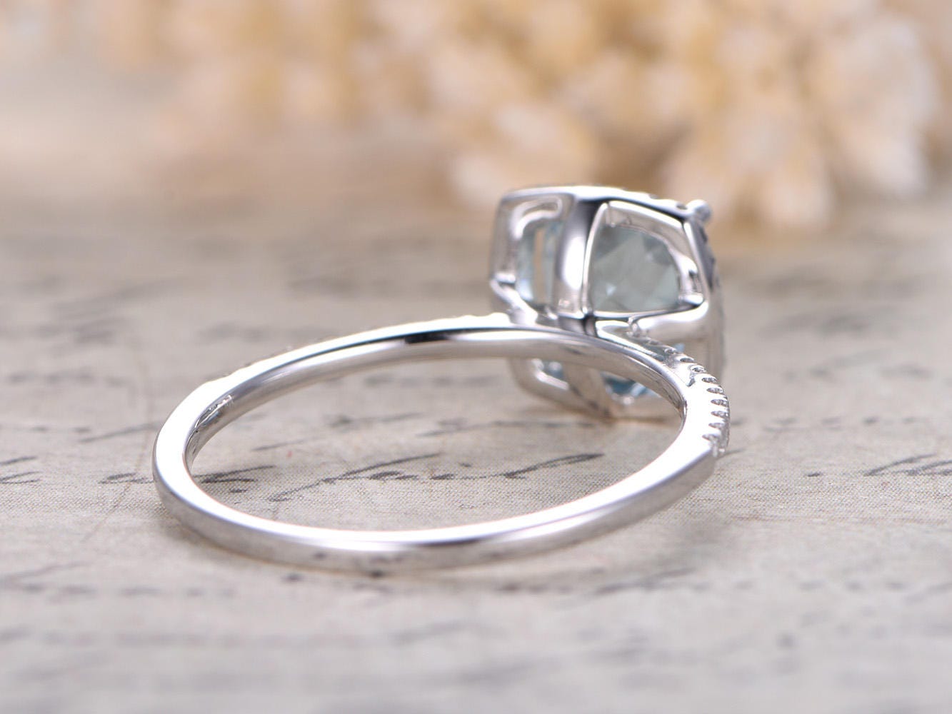 7mm-cushion-cut-aquamarine-engagement-ring-14k-white-gold-half-eternity-diamond-halo-design