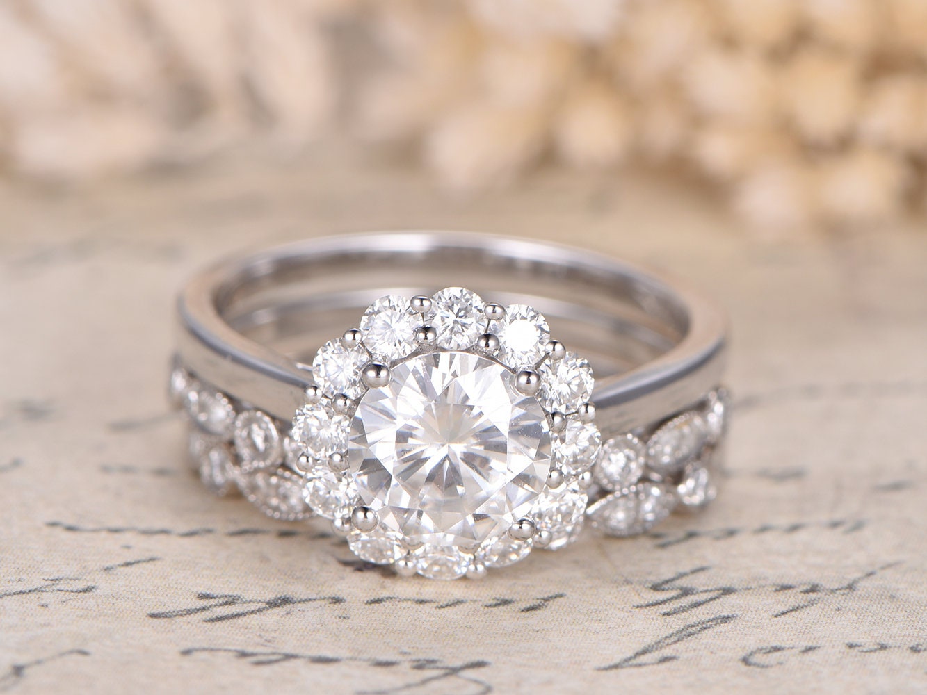 7mm-round-cut-moissanite-engagement-ring-set-3pcs-14k-white-gold-floral-halo-two-art-deco-band