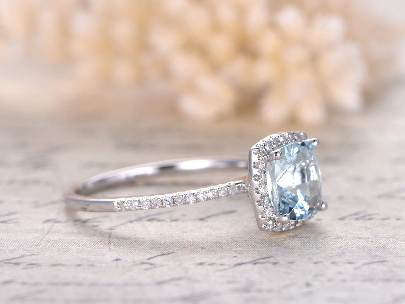 7mm-cushion-cut-aquamarine-engagement-ring-14k-white-gold-half-eternity-diamond-halo-design