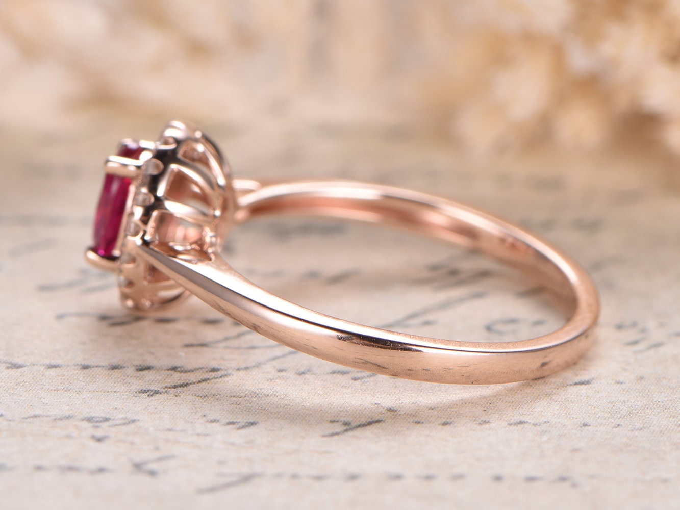 4x6mm-oval-cut-ruby-engagement-ring-14k-rose-gold-plain-band-diamond-halo