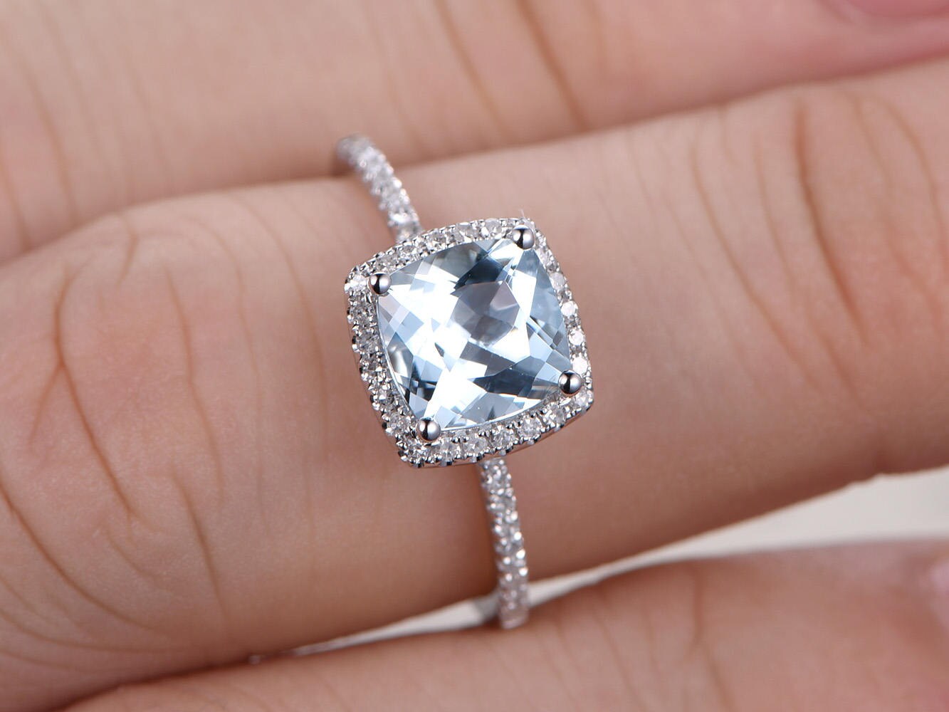 7mm-cushion-cut-aquamarine-engagement-ring-14k-white-gold-half-eternity-diamond-halo-design