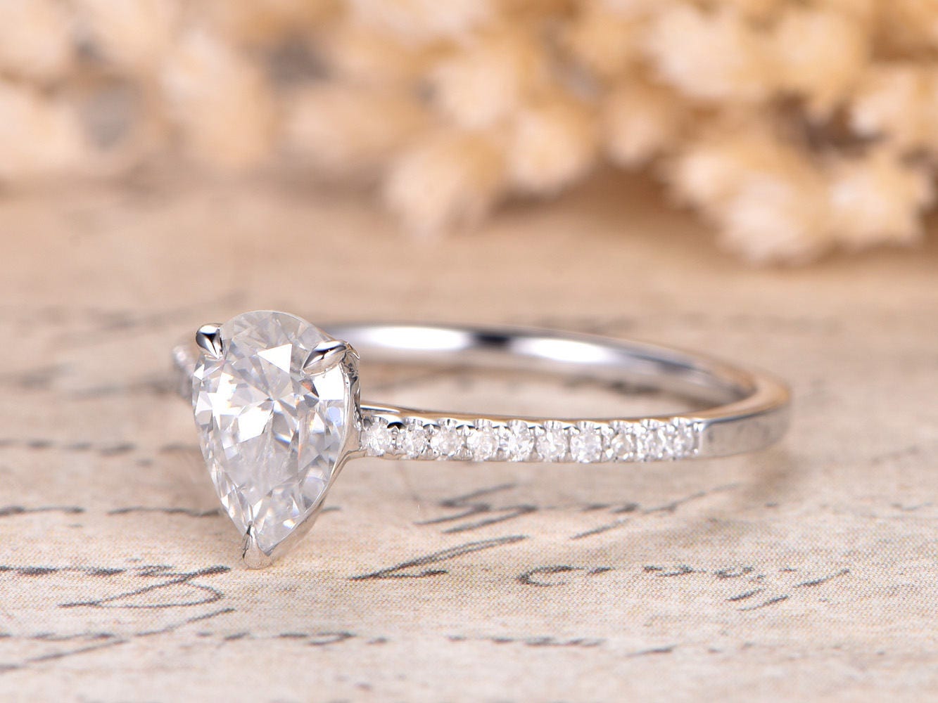 5x7mm-pear-cut-moissanite-engagement-ring-14k-white-gold-diamond-half-eternity-solitaire-design